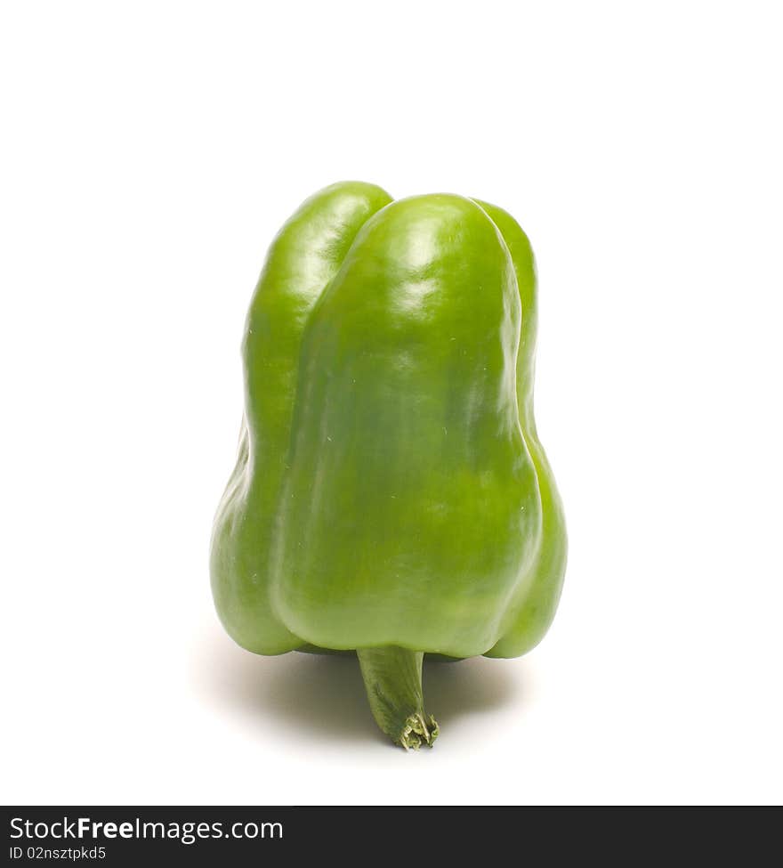 Green pepper on a white background. Green pepper on a white background.