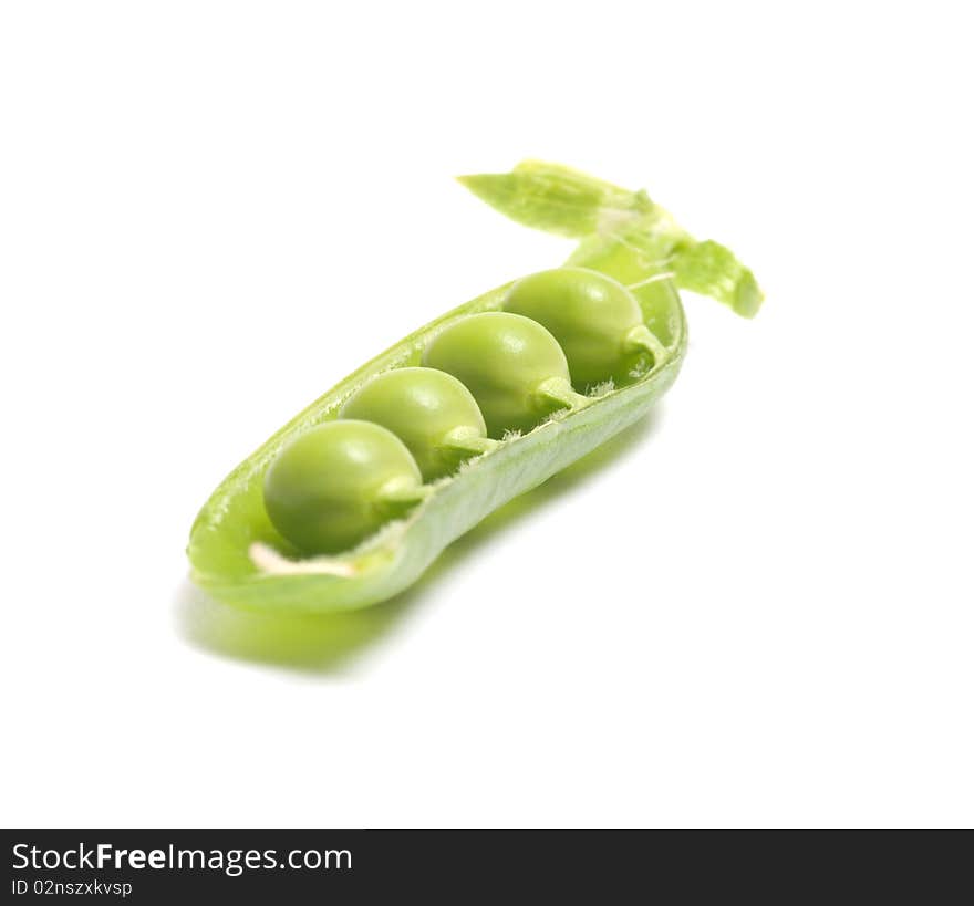 Half of a pod of peas on a white background. Half of a pod of peas on a white background.