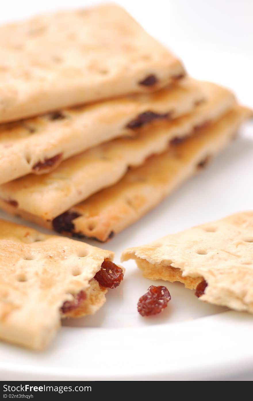 Raisin cookies on a white plate