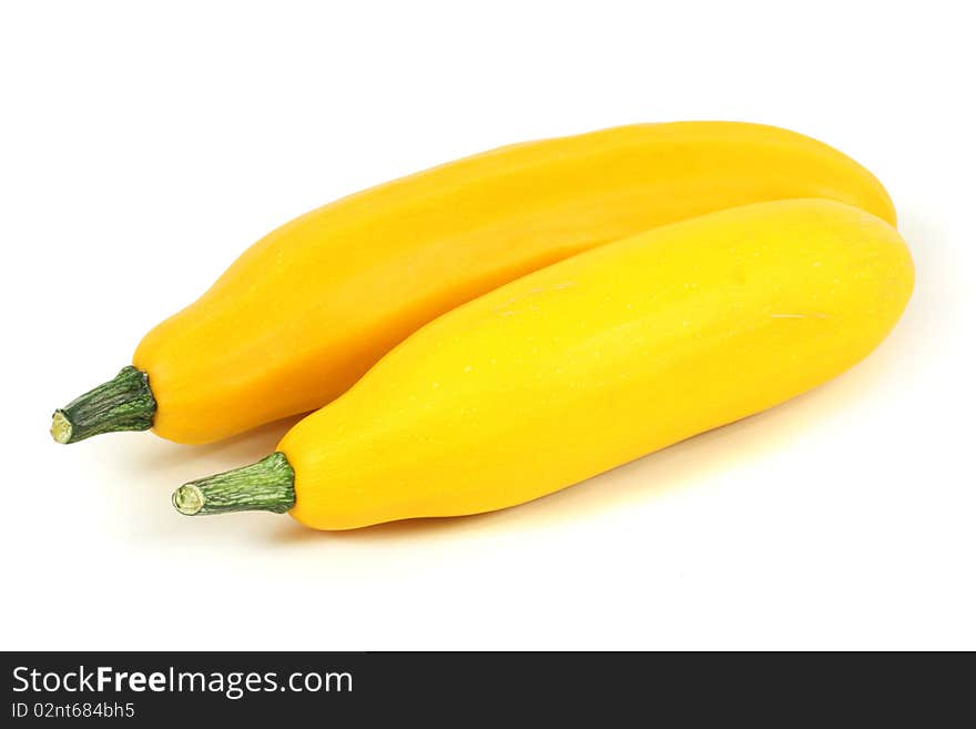 Two zucchini on white background
