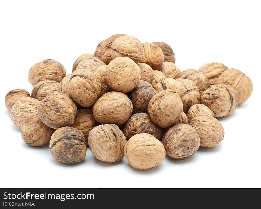 Walnuts isolated on a white background.