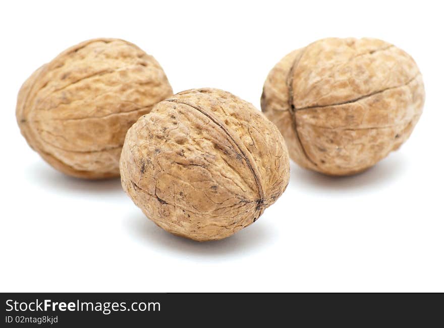 Walnuts isolated on a white background. Walnuts isolated on a white background.