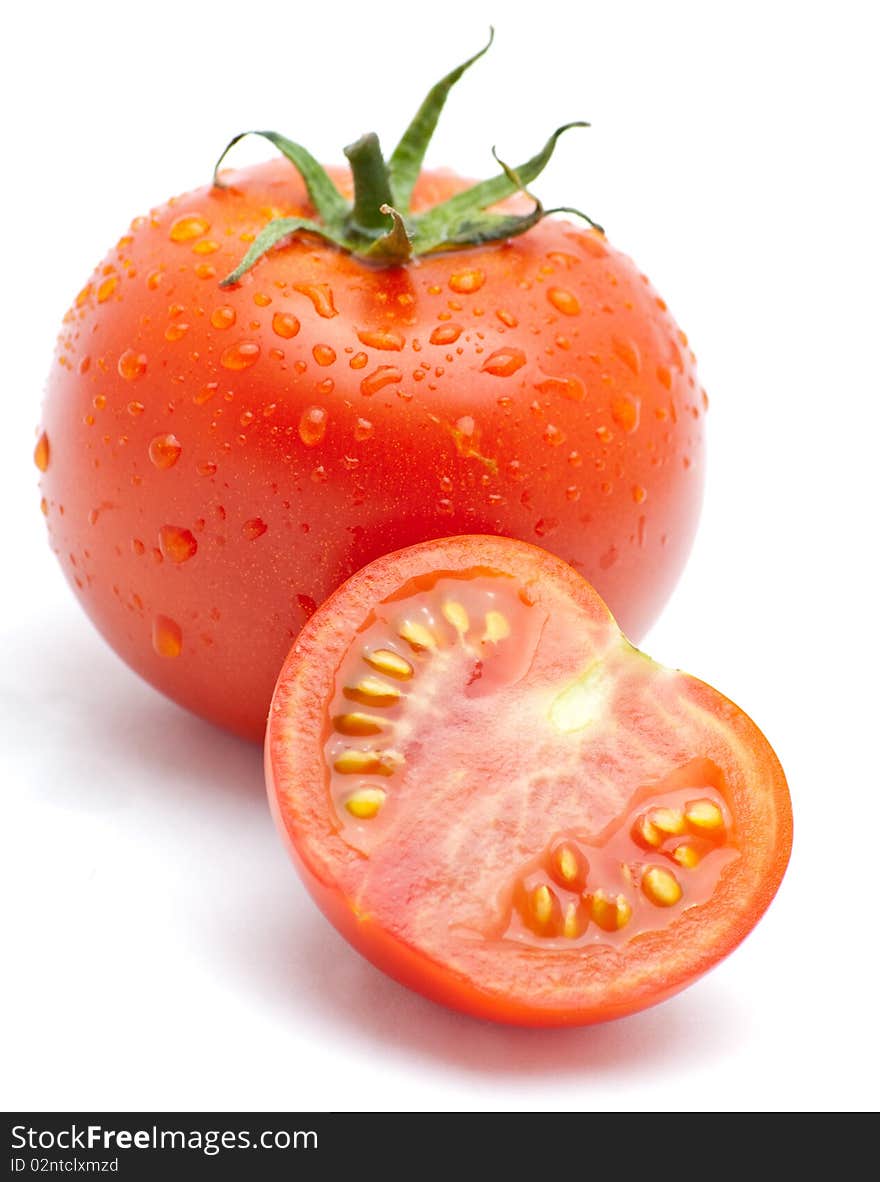 Fresh tomatoes  isolated on a white background.