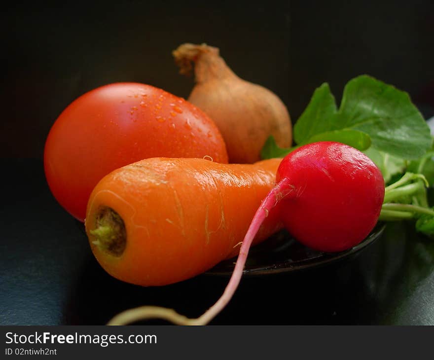 The Colorful Vegetables On A Black Background