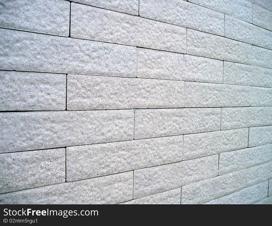 Bricks are compartible to the wall.It's white color .It made fromlime and cement.