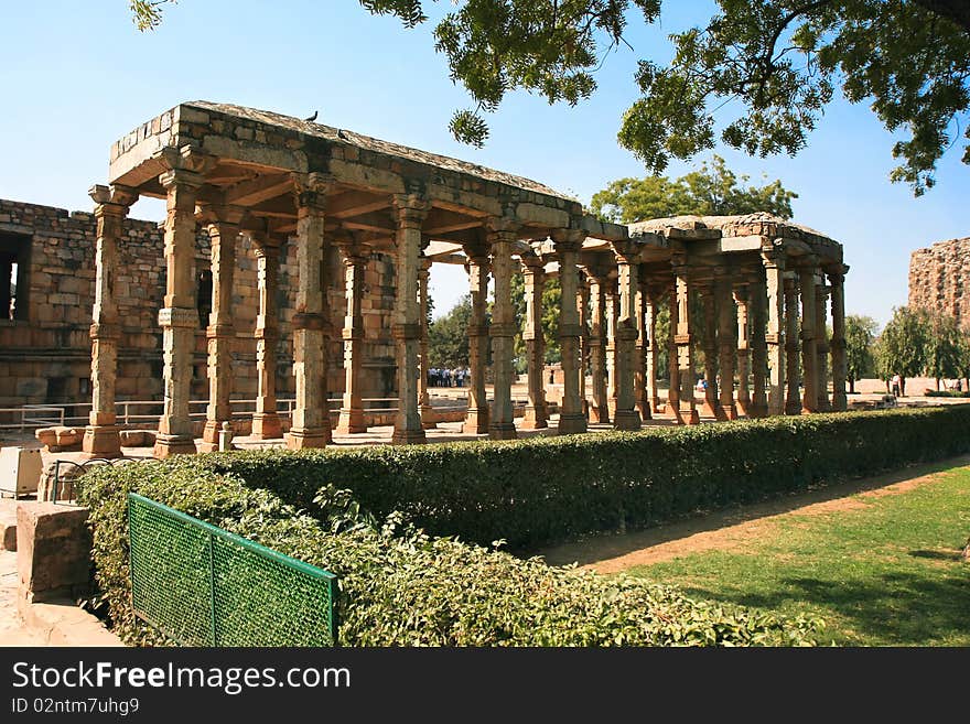 Qutb Minar. Ancient carved stone cloisters. New Delhi, India