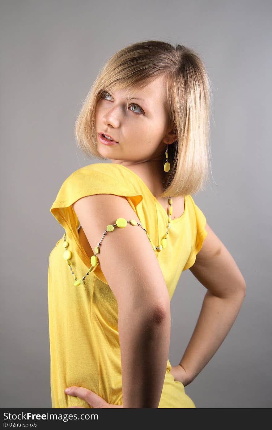 Smiling Girl In Yellow Shirt