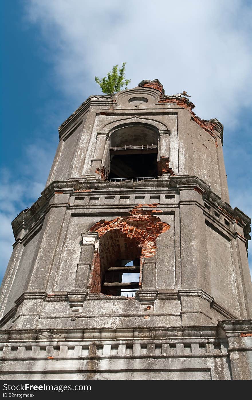 Ruins of old brick church against the blue sky with clouds. Ruins of old brick church against the blue sky with clouds