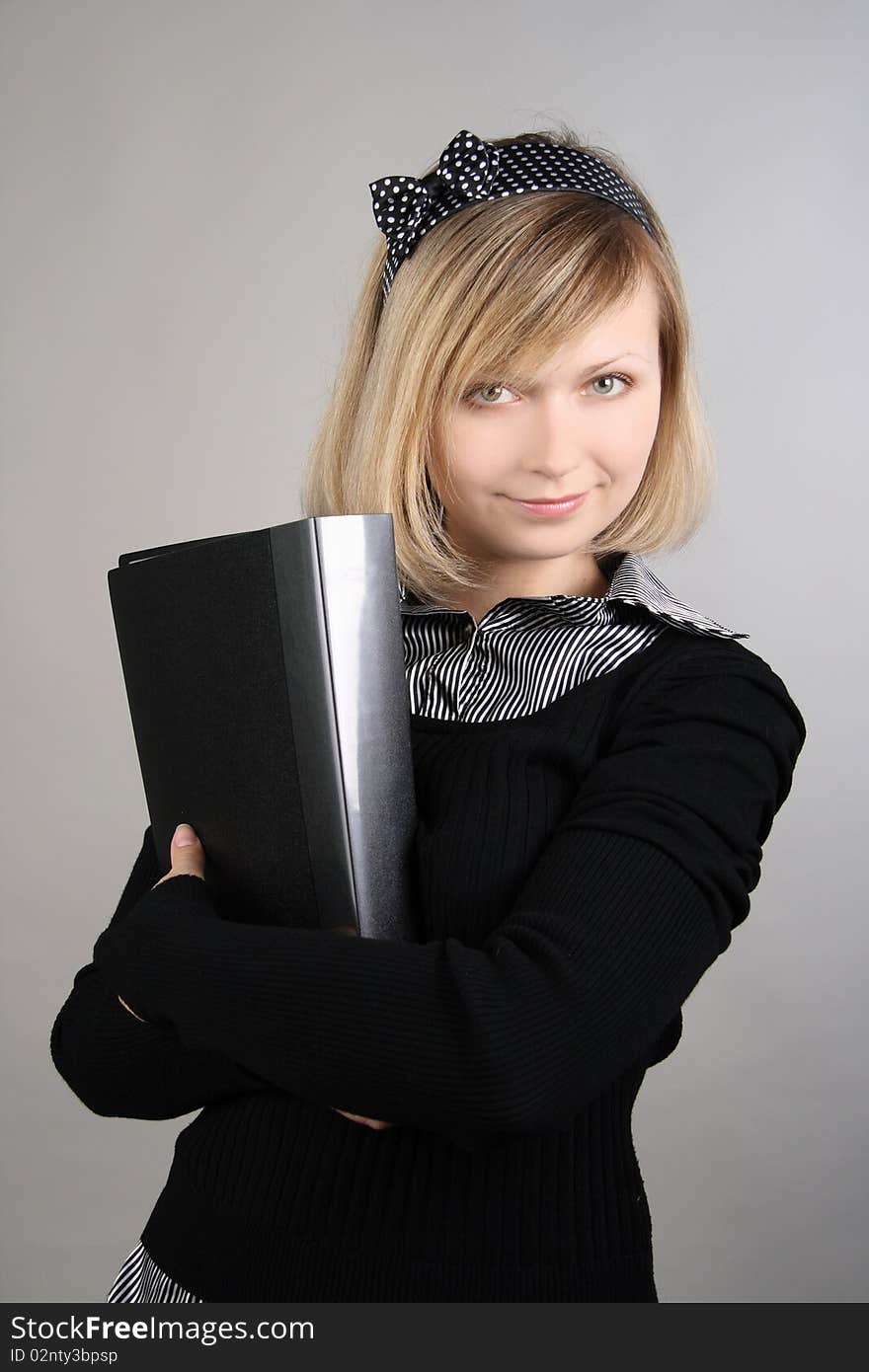 Portrait of business girl with papers