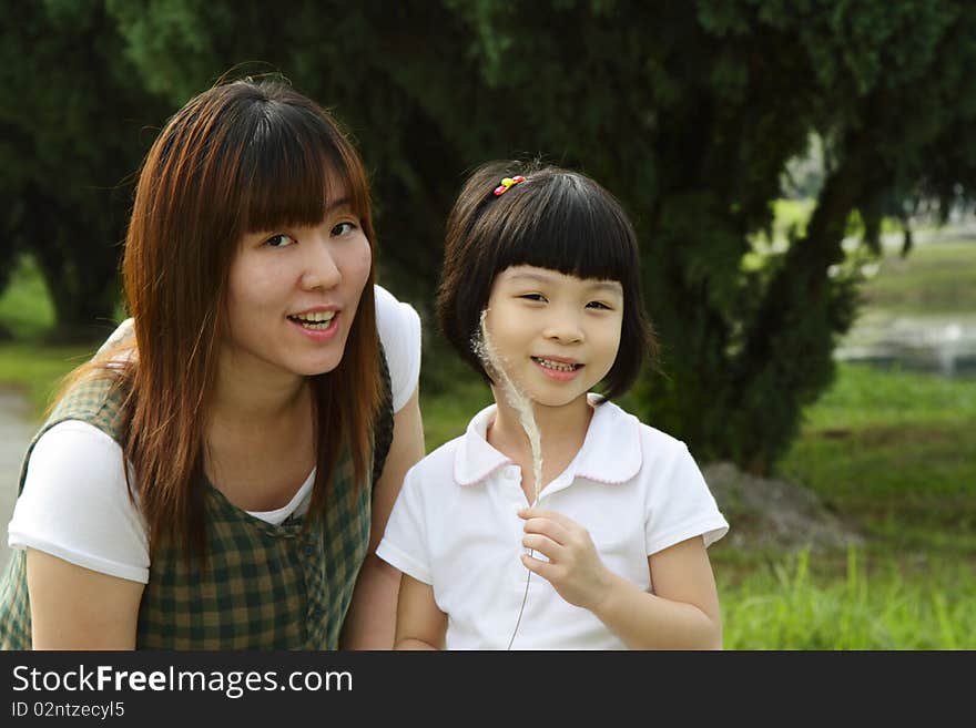 Mother and Daughter in park