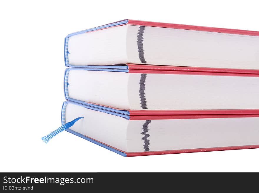 Three books against white background