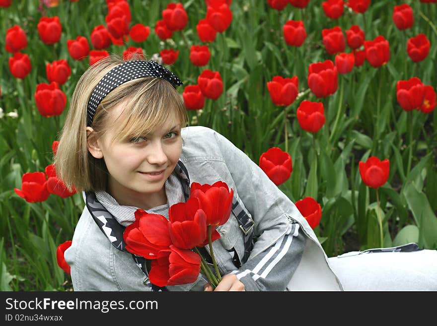 Portrait of girl in tulips