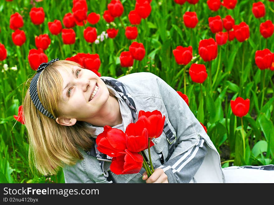 Portrait of girl in tulips