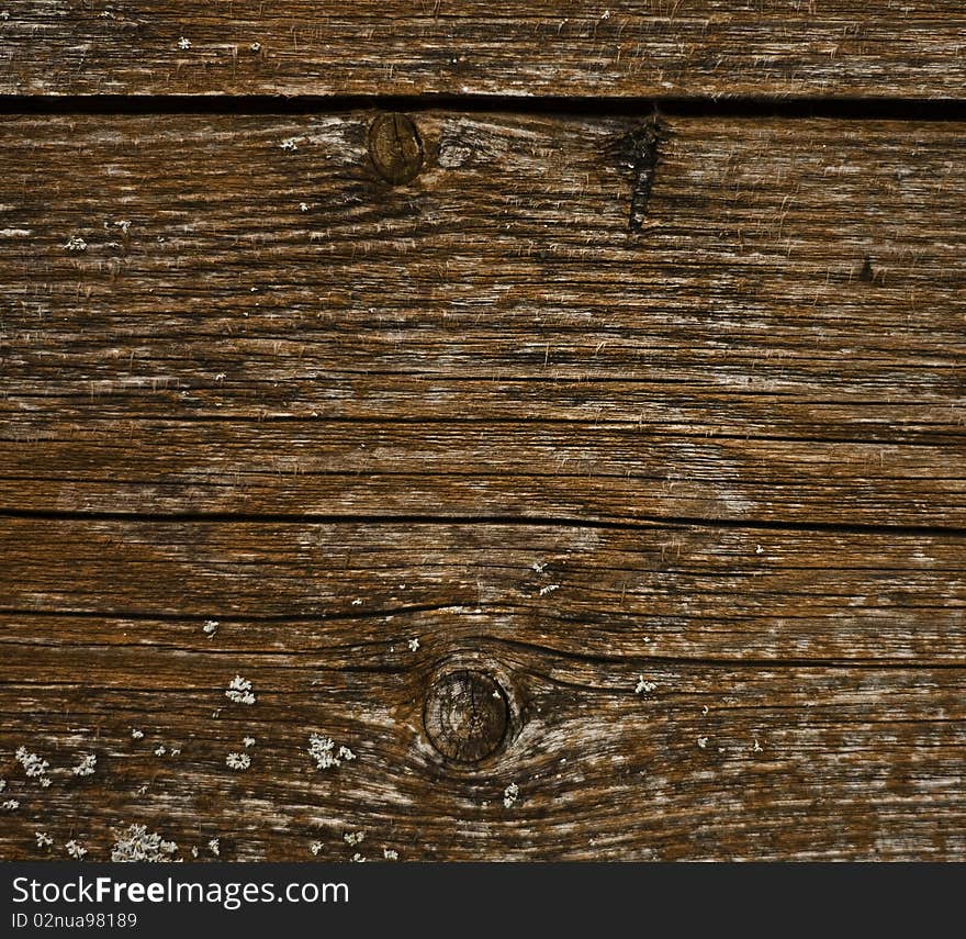 Wooden surface of a board.