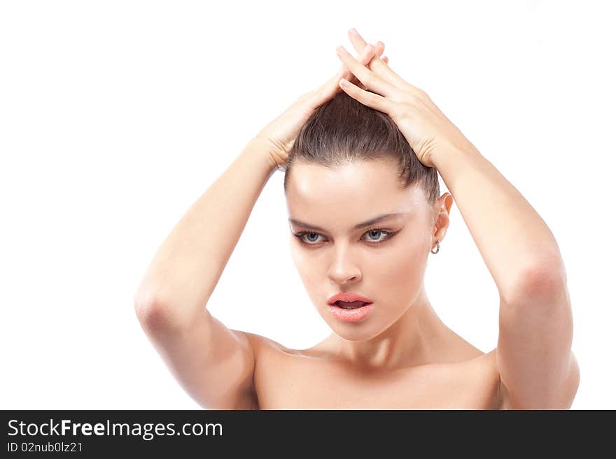 Portrait of beautiful young brunette woman holding head with hands with open mouth. Portrait of beautiful young brunette woman holding head with hands with open mouth