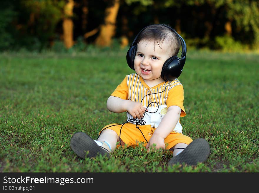 Little boy with headphones horizontal