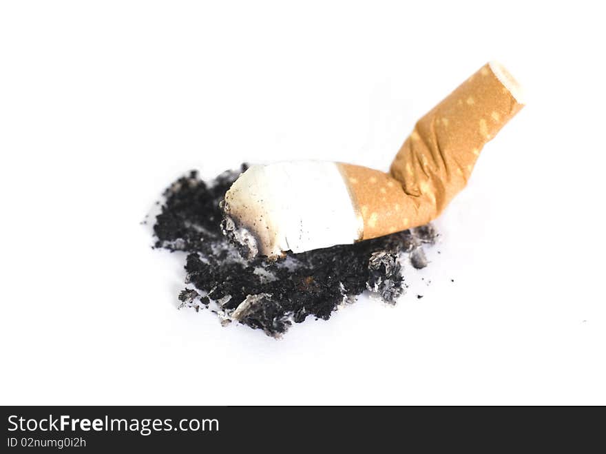 Shot of cigarette stump isolated on white background. Shot of cigarette stump isolated on white background.