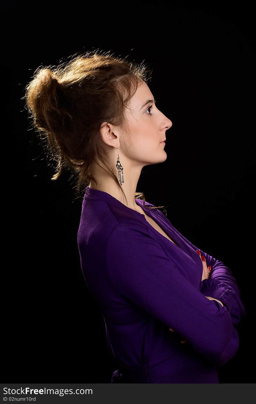 Portrait of a beautiful woman. Black background. Studio shot. Portrait of a beautiful woman. Black background. Studio shot.