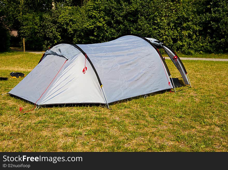 A tent on a grassfield