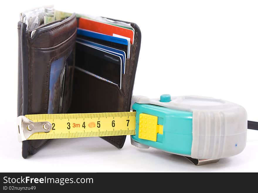 Brown wallet and yellow tape measure isolated on white background