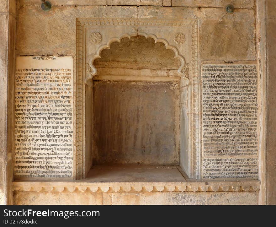 Old hindu scriptures on palace wall