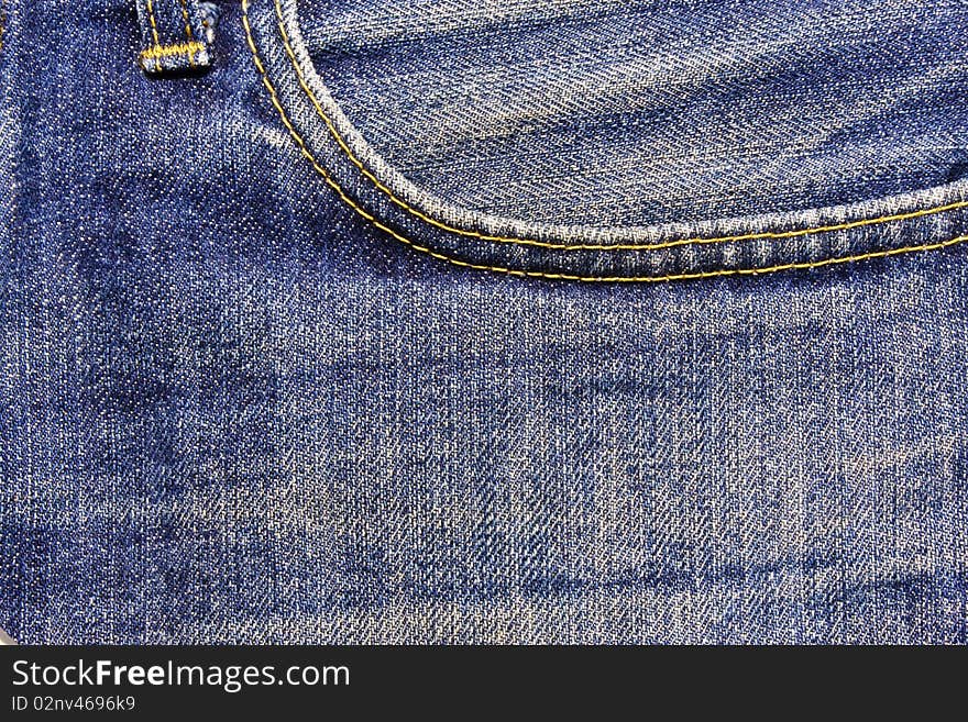 Left pocket of jeans pants texture.