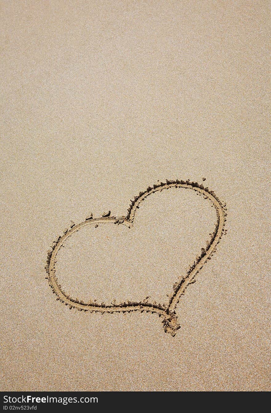 Heart drawing on sea sand. Heart drawing on sea sand