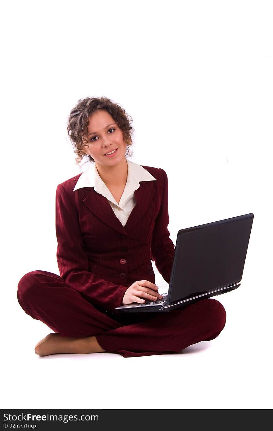 Attractive businesswoman with  laptop on white background Young operator works on computer. Attractive businesswoman with  laptop on white background Young operator works on computer.