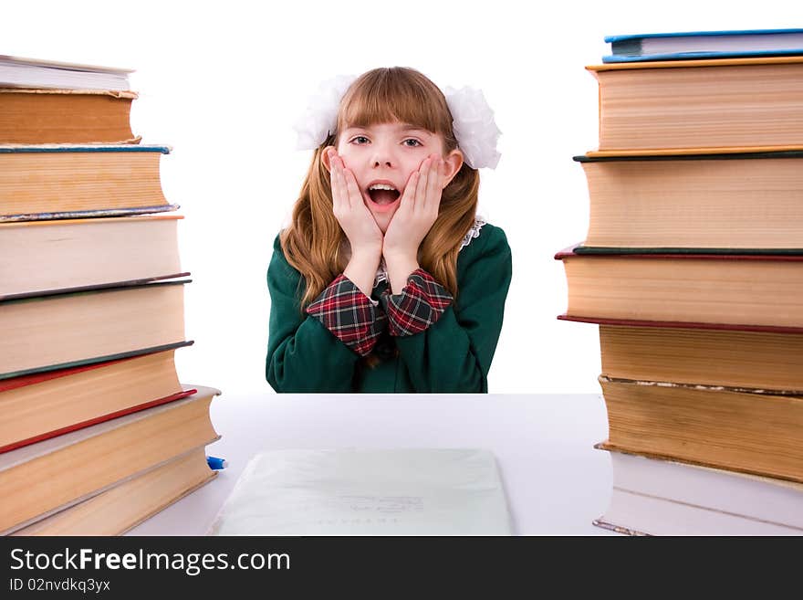 Senior high school student in uniform is sitting on the stack of book and study up. Young and beautiful schoolgirl is wearing a traditional uniform is shocked by something. Senior high school student in uniform is sitting on the stack of book and study up. Young and beautiful schoolgirl is wearing a traditional uniform is shocked by something.