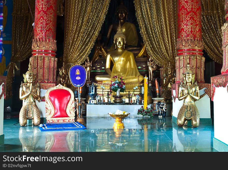 Gold buddha image in thai temple