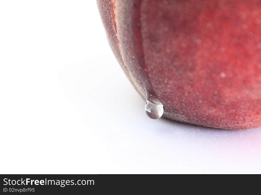 Fresh red peach with leaking water drop closeup, macro. Fresh red peach with leaking water drop closeup, macro