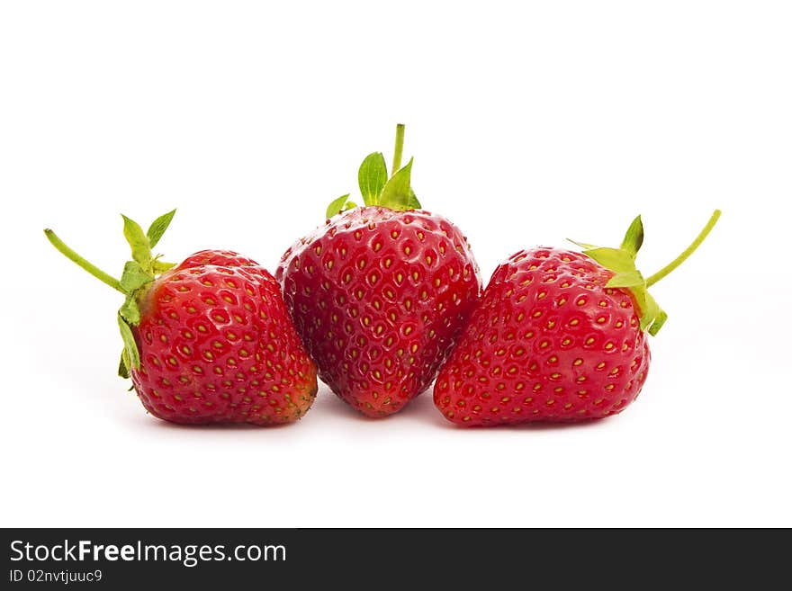 Strawberries isolated on white close-up. Strawberries isolated on white close-up