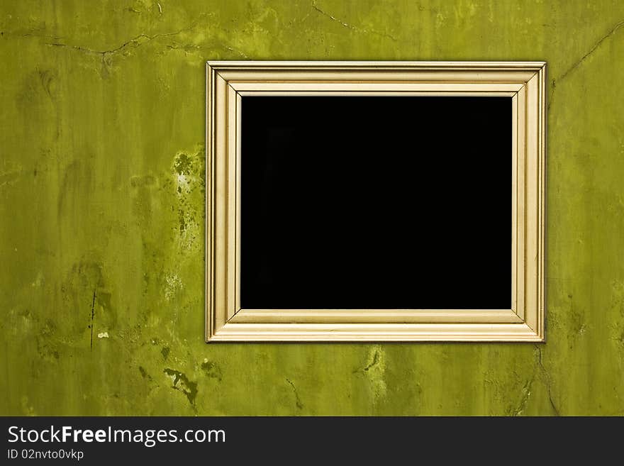 Empty frame on vintage cracked concrete wall