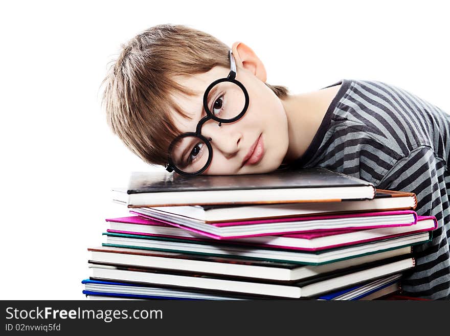 Educational theme: funny teenager with books. Isolated over white background. Educational theme: funny teenager with books. Isolated over white background.