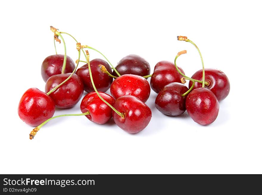 Ripe cherries isolated on white background