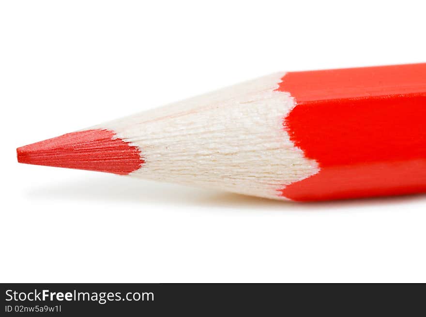 Red pencil isolated on white background close up