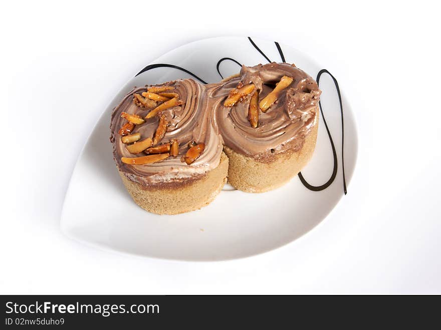 Sweet cappuccino almond roll isolated white background