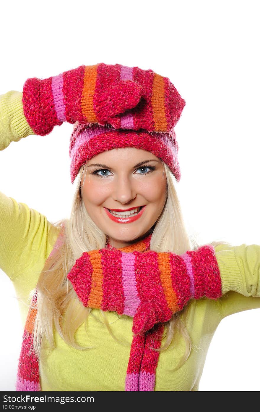 Seasonal portrait of pretty funny woman in hat and gloves smiling. Seasonal portrait of pretty funny woman in hat and gloves smiling