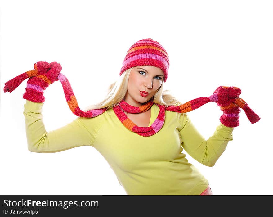 Seasonal portrait of pretty funny woman in hat and gloves smiling. Seasonal portrait of pretty funny woman in hat and gloves smiling