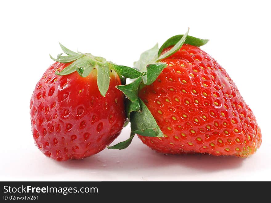 Couple of strawberries on a white background. Couple of strawberries on a white background