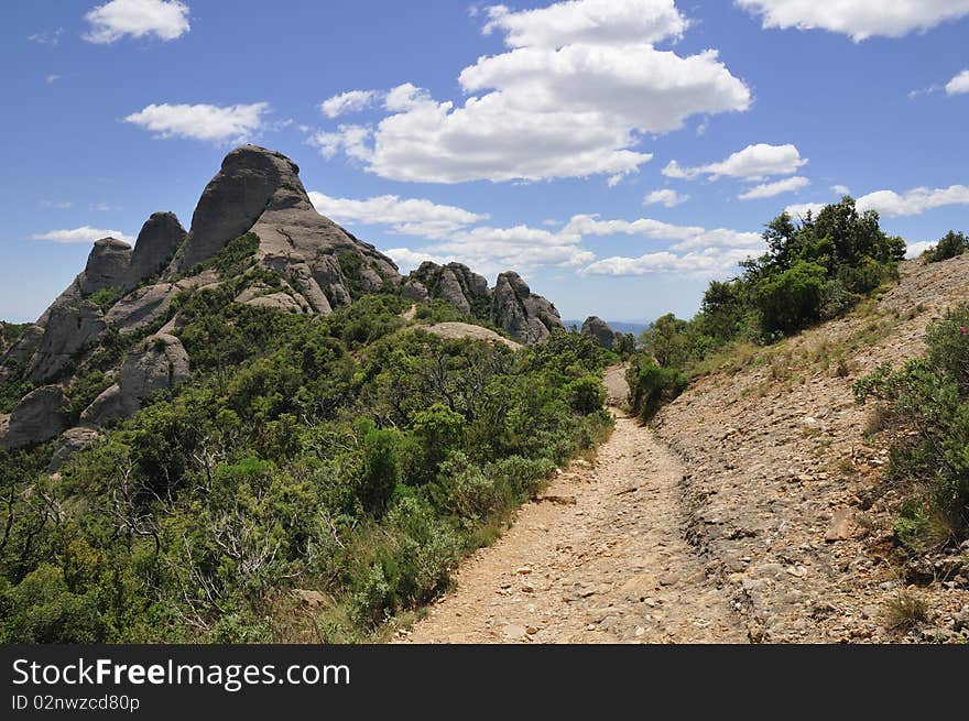 Scenic pathway in Spanish mountains in Barcelona area close to famous Monserrat Monastery. Scenic pathway in Spanish mountains in Barcelona area close to famous Monserrat Monastery