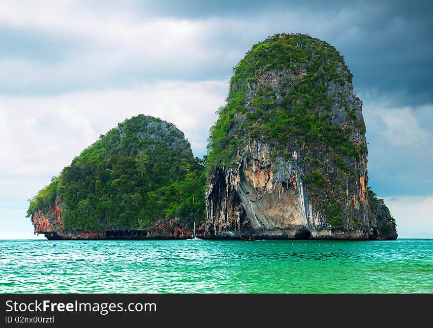 High cliffs on the tropical island. Exotic tropical landscape.