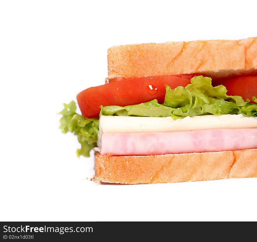 Sandwich with ham, lettuce and cheese on white background. close-up. Sandwich with ham, lettuce and cheese on white background. close-up