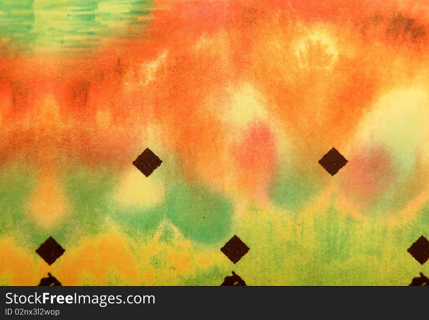 Orange, green, and yellow abstract background. fabric texture. Orange, green, and yellow abstract background. fabric texture