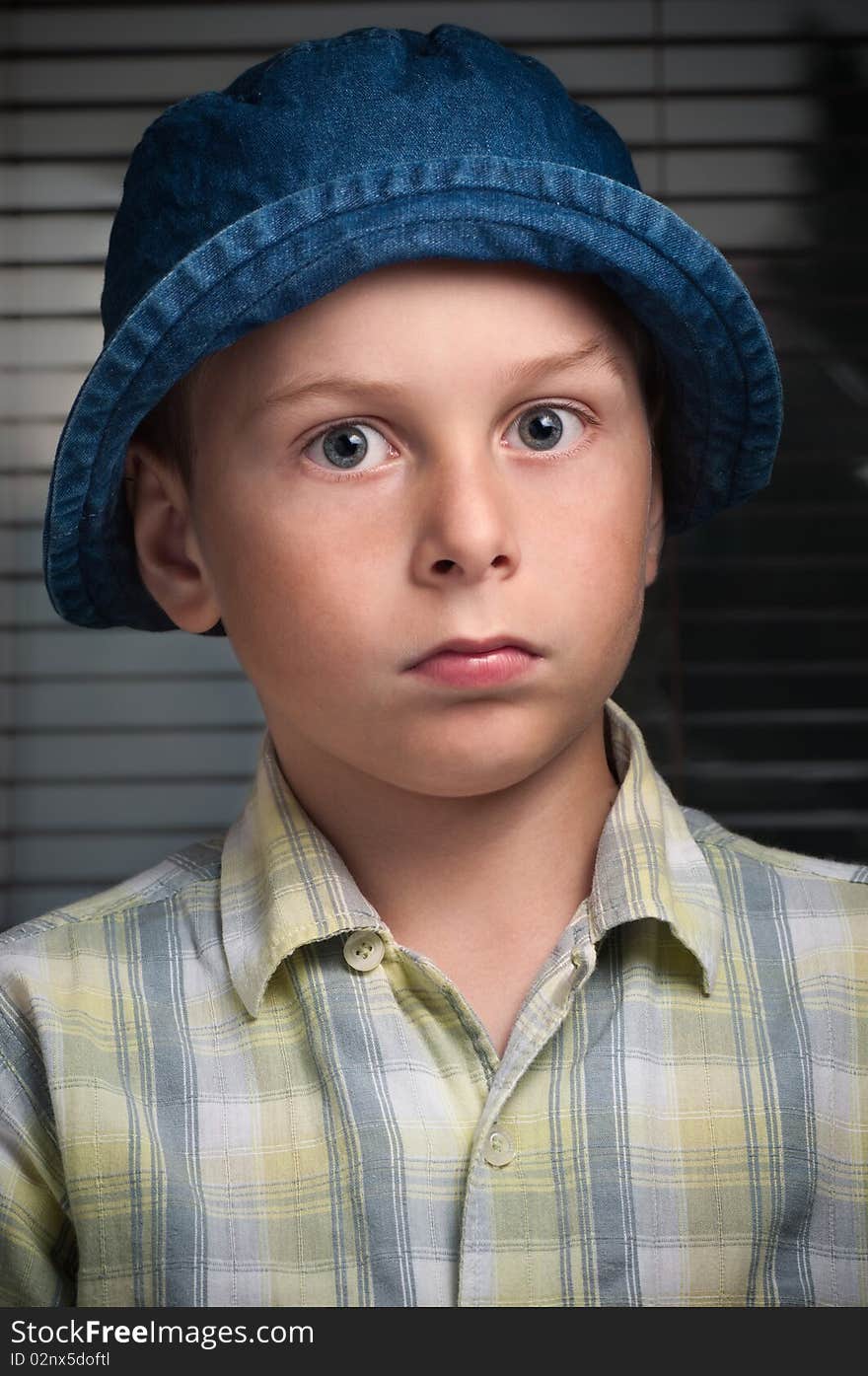 Portrait of the boy with denim hat. Portrait of the boy with denim hat