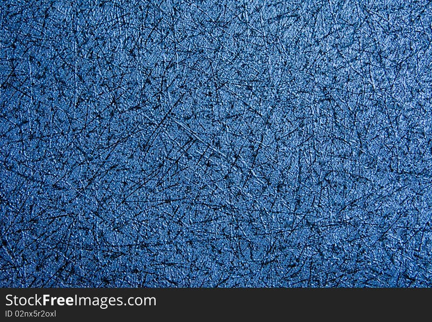 A texture of a blue-black wall paper. A texture of a blue-black wall paper.