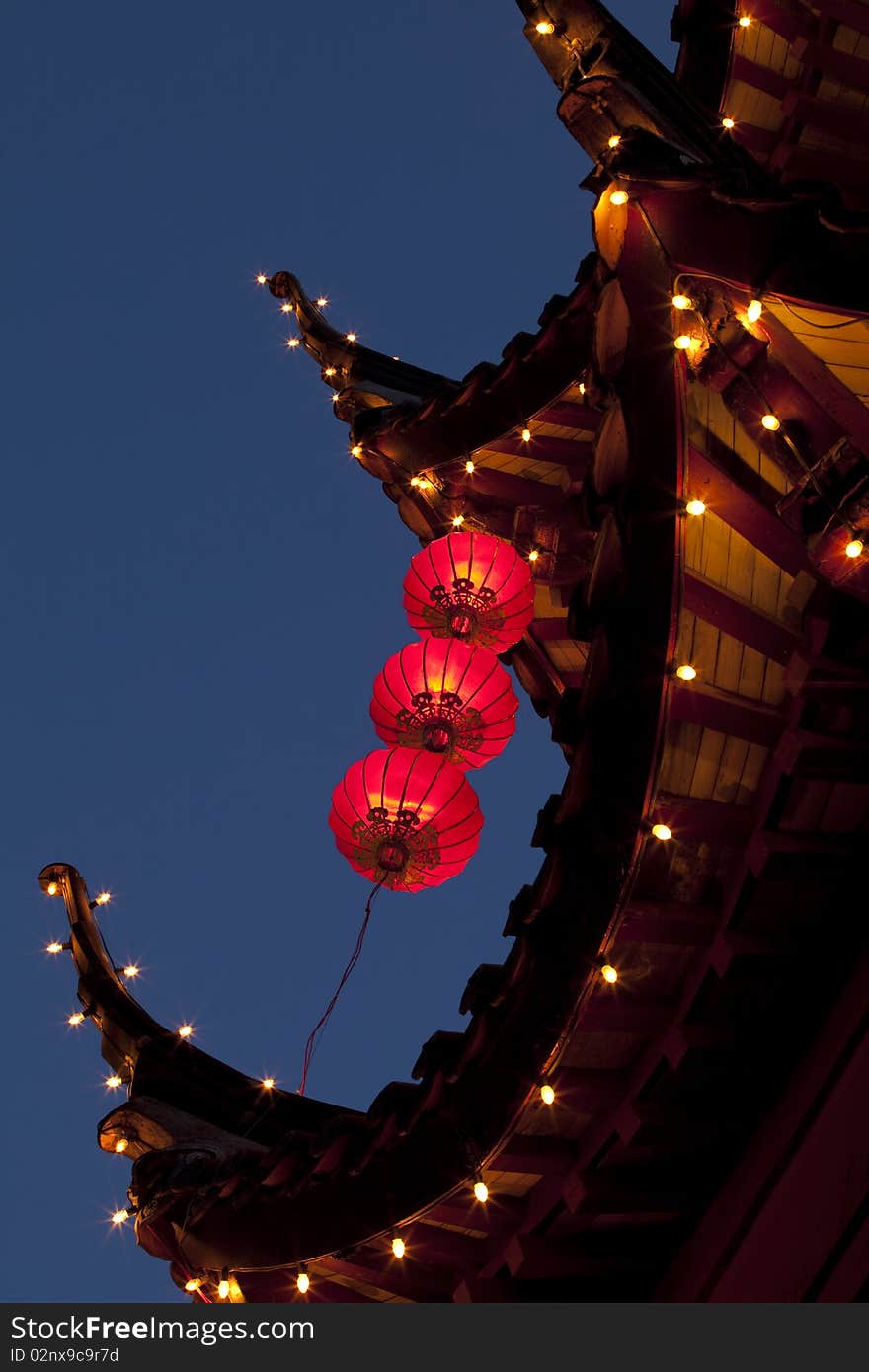 Chinese house architecture with decorative lighting  at night. Chinese house architecture with decorative lighting  at night