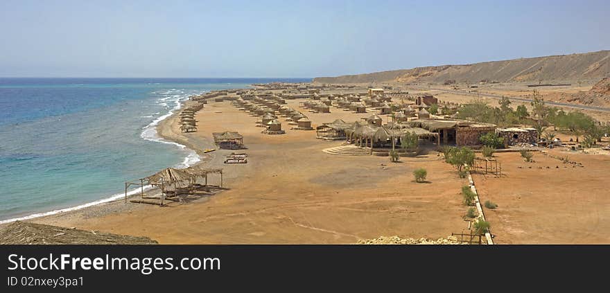 Panoramic view of a beach camp at a tropical resort. Panoramic view of a beach camp at a tropical resort