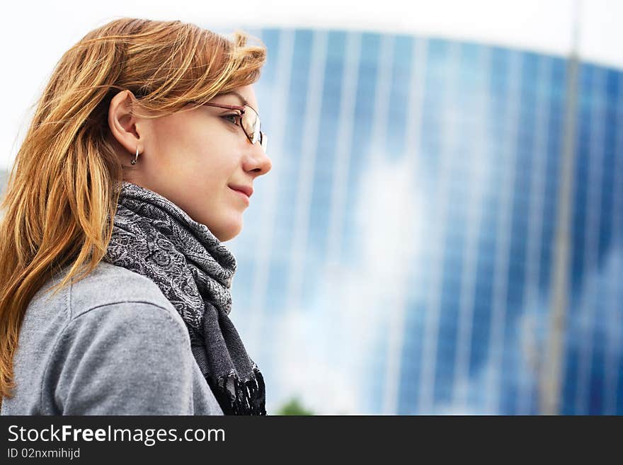 The girl on a background of a building