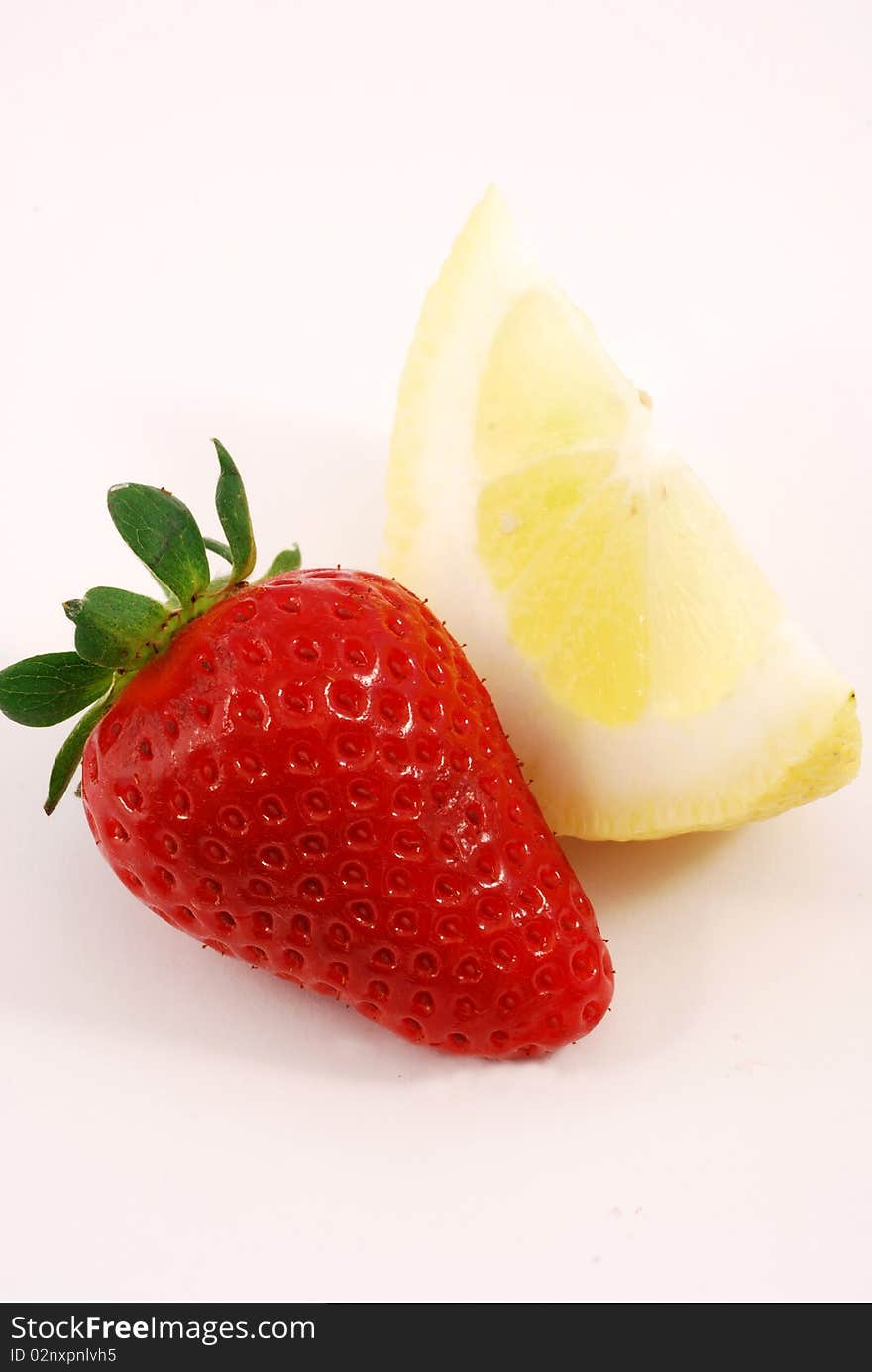 Strawberry with lemon white background. Strawberry with lemon white background